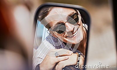 Car mirror reflection, road trip and face of man happy, smile or relax with sunglasses on Sydney Australia tour Stock Photo