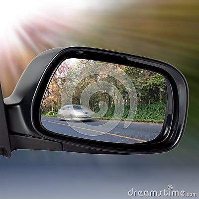 Car Mirror on The Road Stock Photo