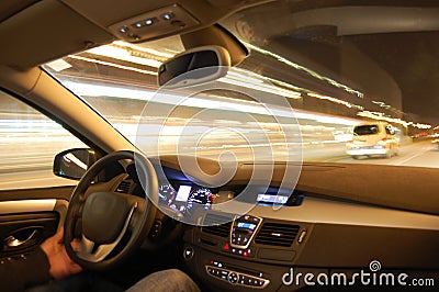 Car in motion at night Stock Photo