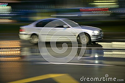 Car moving in rainy night motion blur Stock Photo