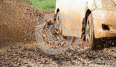 Rally race car on muddy road Stock Photo