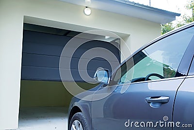 Car near the automatic garage door Stock Photo