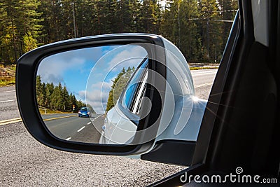 Car overtaking another vehicle on the highway in Finland. Stock Photo