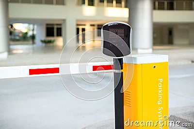 Car park automatic entry system. Security system for building access - barrier gate stop with toll booth, traffic cones Stock Photo