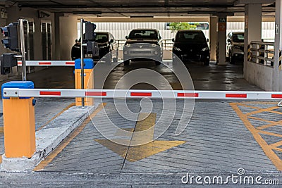 Car park automatic entry system.Security system for building access - barrier gate stop with toll booth, traffic cones Stock Photo