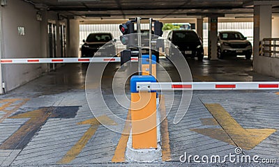 Car park automatic entry system.Security system for building access - barrier gate stop with toll booth, traffic cones Stock Photo