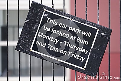 Car park close open times sign on entrance Stock Photo