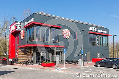 Car park near Dutch motorway with KFC fastfood restaurant Editorial Stock Photo