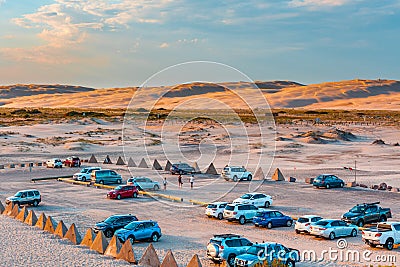 Car park on the sand. Editorial Stock Photo