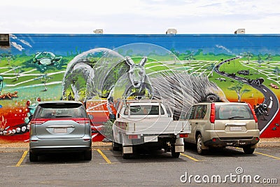 Car parking and wildlife wall painting, Alice Springs, Australia Editorial Stock Photo