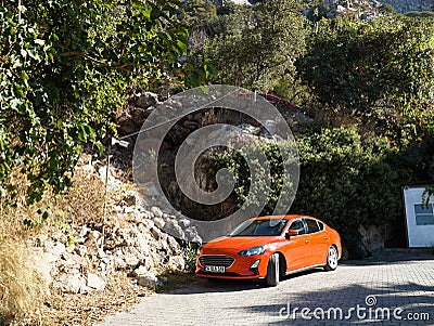 Car parks on a mountain road near a residential building. South of Turkey. Editorial Stock Photo