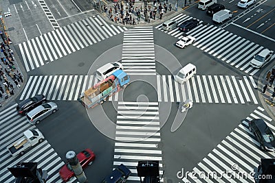 Car passing the street crossing in Ginza district Editorial Stock Photo