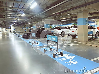 Car priority park for people with disabilities,pregnant women,families with young children at IKEA Store Editorial Stock Photo