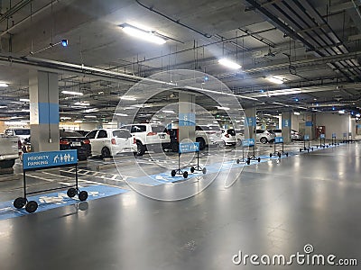 Car priority park for people with disabilities,pregnant women,families with young children at IKEA Store Editorial Stock Photo