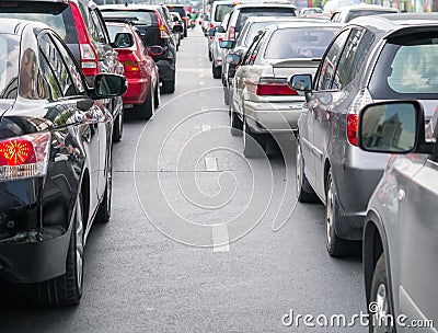Car queue in the bad traffic road Stock Photo