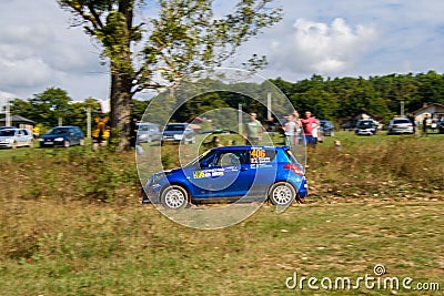 Car racing at the annual rallying event in Iasi at green Dobrovat forest road Editorial Stock Photo