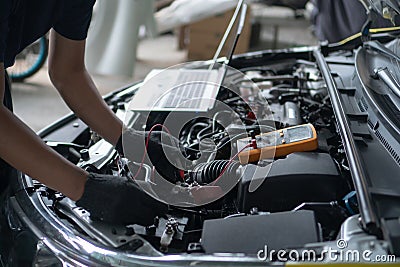 Car repair and maintenance. Performing engine diagnostics Stock Photo