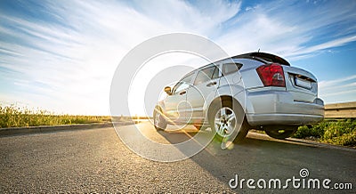 Car on road over sunny day Stock Photo