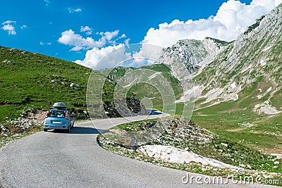 Car on scenic mountain road, which is highest road pass in Montenegro. Durmitor National Park. Adventure road trip Stock Photo