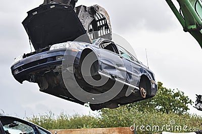 Car on a mechanical grabber Stock Photo