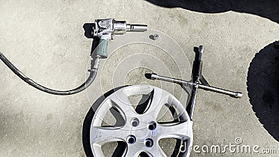 Car service, nut of fixture of a wheel of the car on a white background, Stock Photo