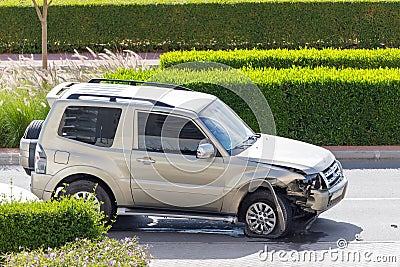 Car on the side of the road after it was involved in to an accident with the front ride side completely smashed. Concept of car Editorial Stock Photo