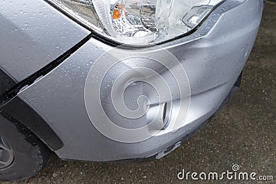 Car silver color crash damage bumper breakdown accident Stock Photo