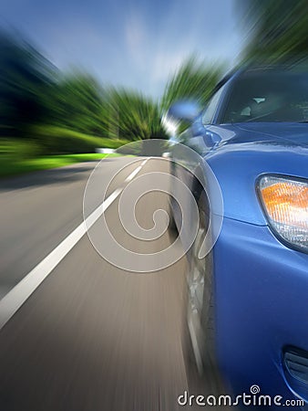 Car at speed Stock Photo