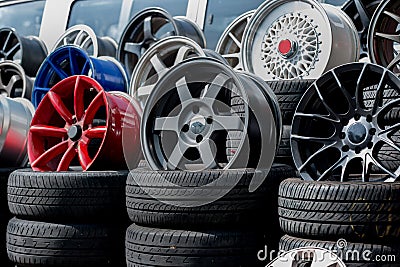 Car sport rims and tyres shown at a tyre shop. Stock Photo