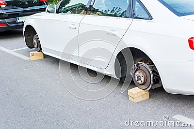Car with stolen wheels Stock Photo