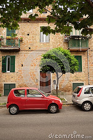 Small car on the street rome near the house Stock Photo