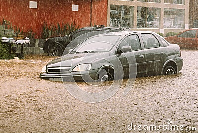 Car stuck in flash flood disaster Editorial Stock Photo