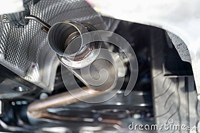 Car suspension and exhaust pipe Stock Photo