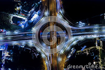 Car, taxi, and bus traffic on road intersection at night, traffic transportation, Asia city life, public transportation, financial Stock Photo