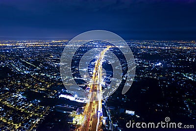 Car, taxi, and bus traffic on road intersection at night, traffic transportation, Asia city life, public transportation, financial Stock Photo