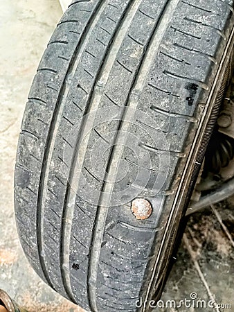 a car tire that is leaking Stock Photo