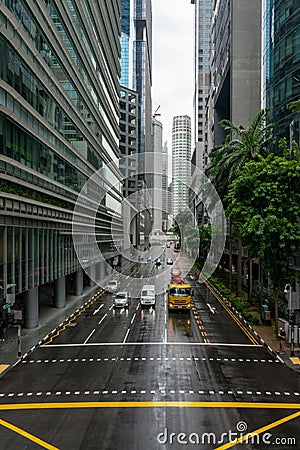 Car traffic downtown Singapore. Central Business District on a rainy day. Editorial Stock Photo