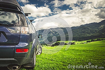 car for traveling with a mountain road Stock Photo