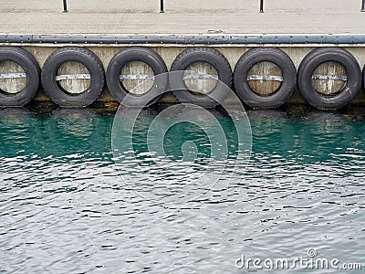 Car tyre pier bumpers Stock Photo