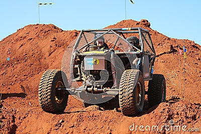 Car waiting on edge to start descent into dugout. Editorial Stock Photo