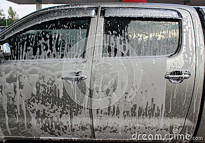 Car wash foam on pickup truck door Stock Photo