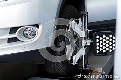 Car wheel adjusted with automobile alignment Stock Photo