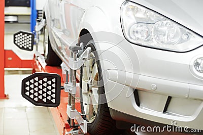 Car at wheel alignment diagnostic tester Stock Photo