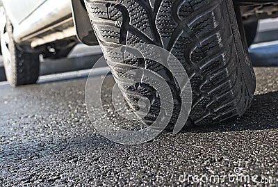 Car wheel on asphalt closeup Stock Photo