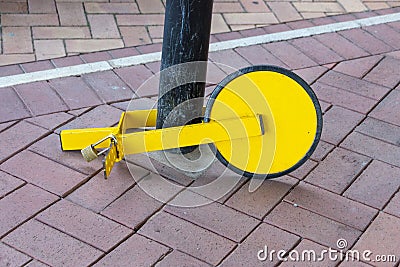 A Car Wheel Clamping Devise Stock Photo