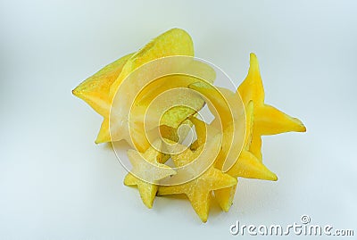 Carambola fruit is ripe with pieces isolated on a white background Stock Photo