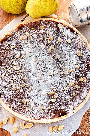 Caramel apple tart with nuts and sugar powder Stock Photo