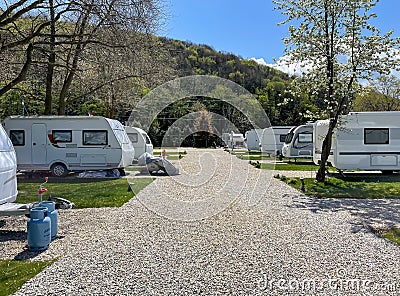 Caravan Camping Site, Caravans in a Camp Site, Relaxing Campsite in nature, Travel Trailers, Trailer park, Summer Camp. Editorial Stock Photo