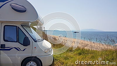 Caravan car by the sea yatch beach summer holidays Stock Photo