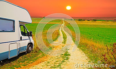Caravan sunset colors nature adventure Stock Photo